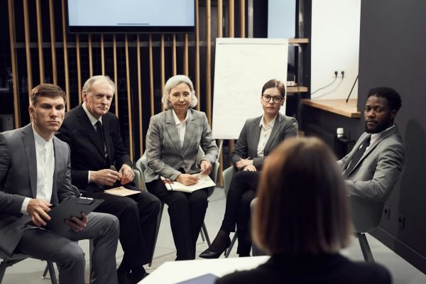 Business people attending course